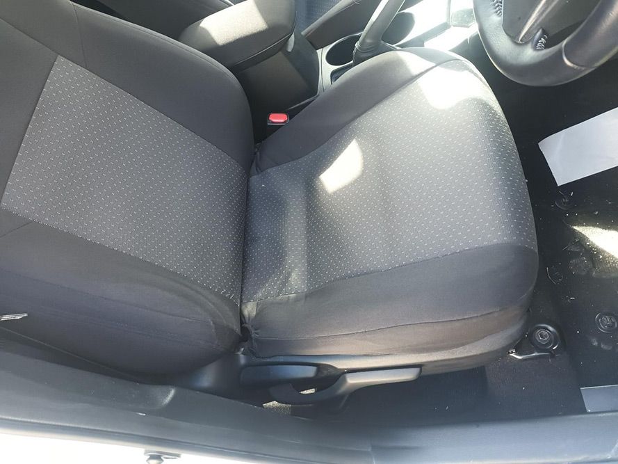 A Close Up of a Car Seat with a Steering Wheel in the Background — South West 4WD Wreckers In Brisbane, QLD