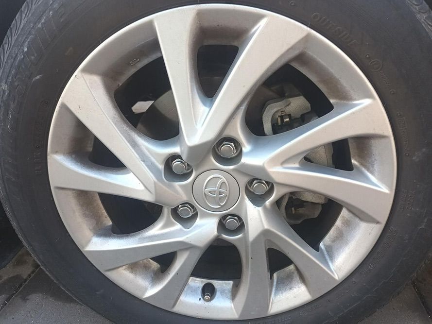 A Close Up of a Car Wheel with a Toyota Logo on It — South West 4WD Wreckers In Brisbane, QLD