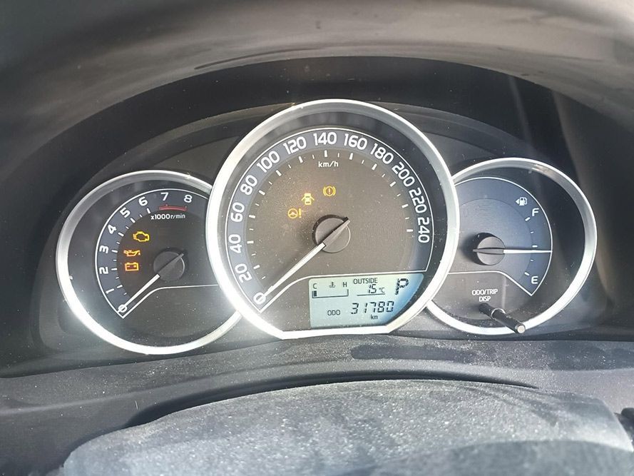 A Close Up of a Cars Dashboard with a Digital Display — South West 4WD Wreckers In Brisbane, QLD
