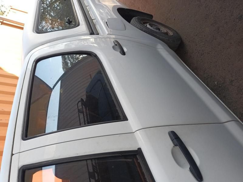 A White Truck is Parked on the Side of the Road — South West 4WD Wreckers In Brisbane, QLD