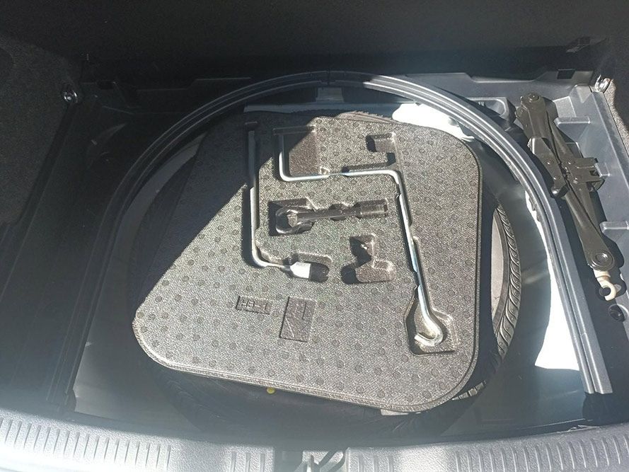 The Trunk of a Car is Filled with Tools and a Tire — South West 4WD Wreckers In Brisbane, QLD 