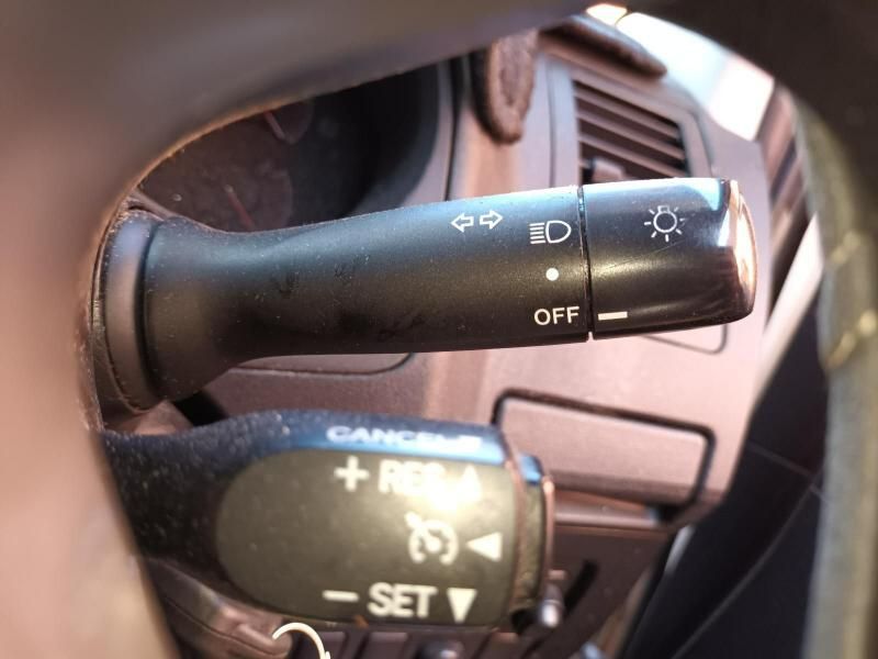 A Close Up of a Car Steering Wheel With a Cancel Button — South West 4WD Wreckers In Brisbane, QLD