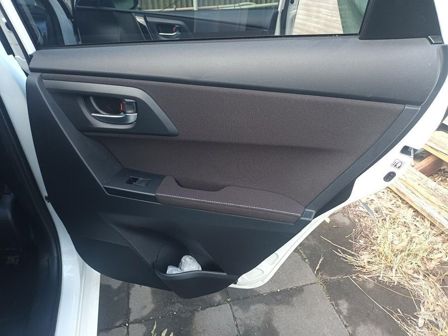 The Back Door of a White Car with the Door Open — South West 4WD Wreckers In Brisbane, QLD