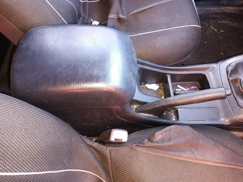 A Car With a Black Arm Rest and a Black Seat Cover — South West 4WD Wreckers In Brisbane, QLD