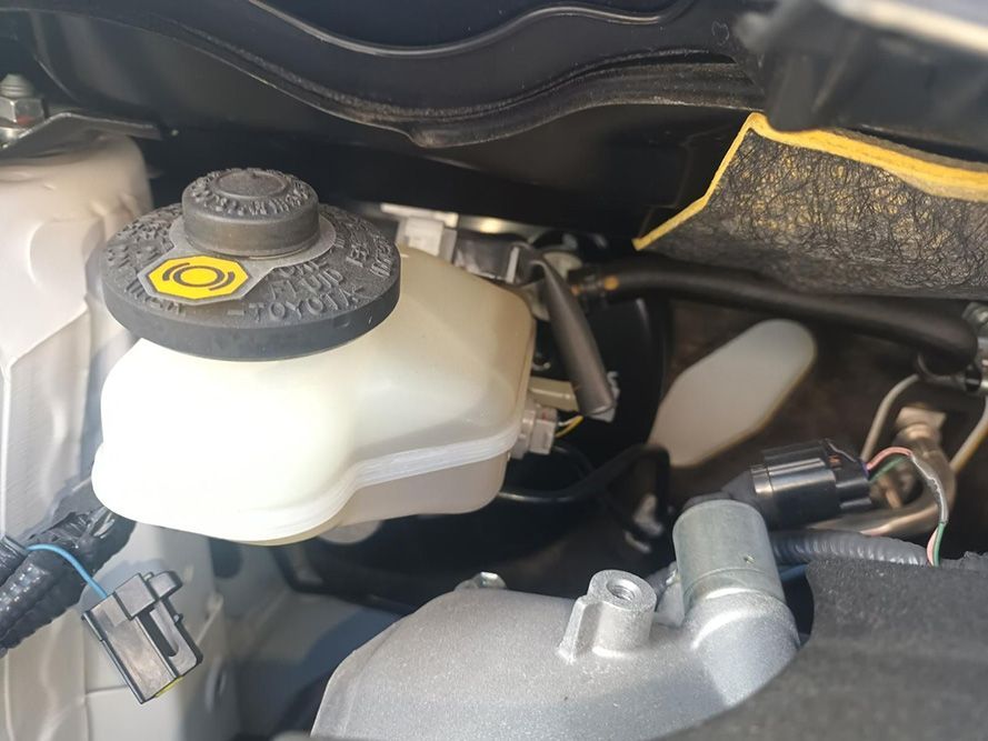 A Close Up of a Brake Fluid Reservoir in a Car — South West 4WD Wreckers In Brisbane, QLD