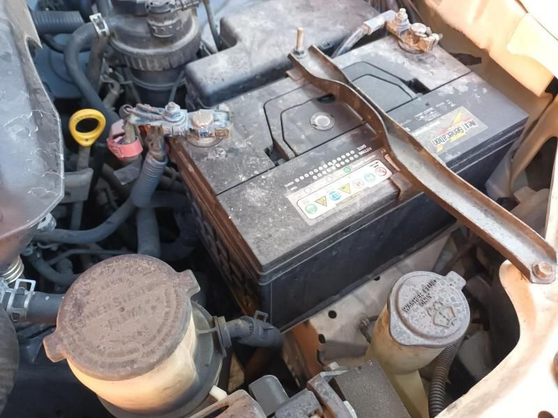 Two Batteries Are Sitting Under the Hood of a Car — South West 4WD Wreckers In Brisbane, QLD