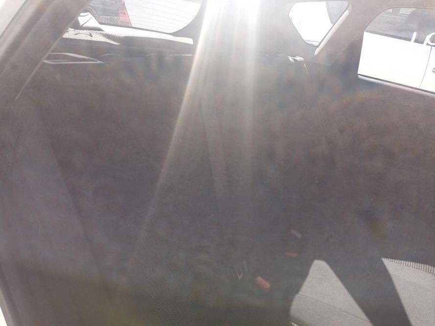 The Back Seat of a Car with the Sun Shining Through the Window — South West 4WD Wreckers In Brisbane, QLD