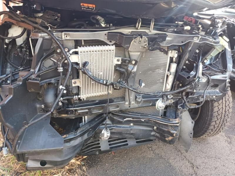The Engine of a Car is Missing and is Sitting on the Ground — South West 4WD Wreckers In Brisbane, QLD