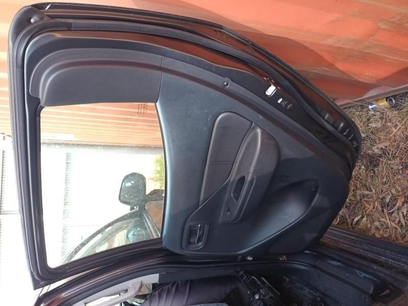 The Back Door of a Black Car is Open — South West 4WD Wreckers In Brisbane, QLD