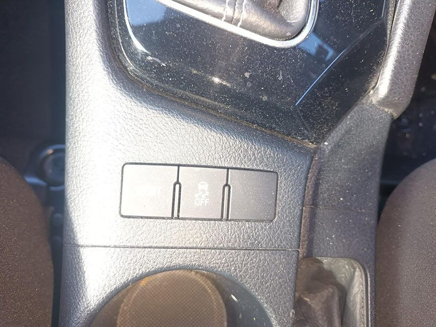 A Close Up of a Car's Center Console with a Shifter and s — South West 4WD Wreckers In Brisbane, QLD