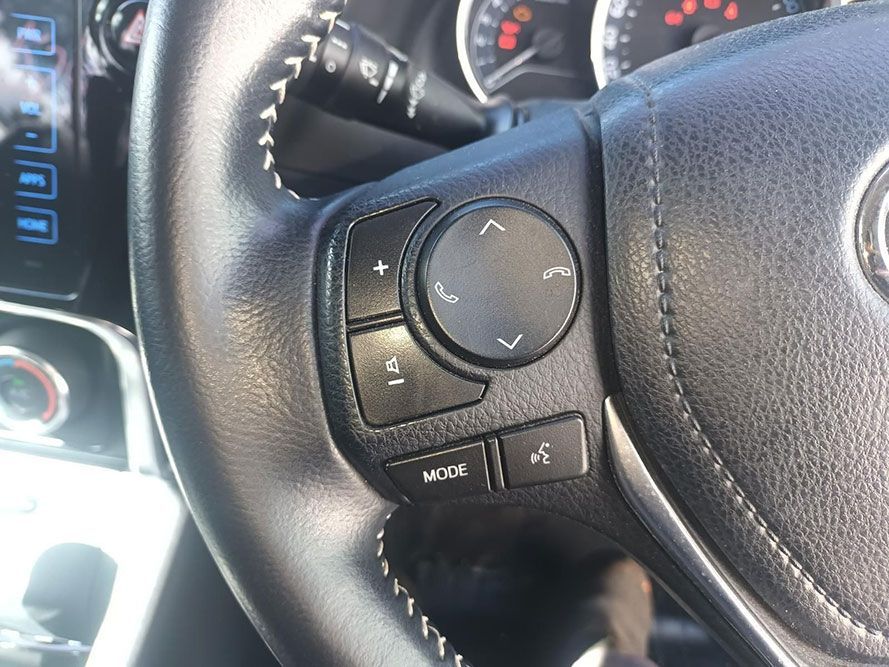 A Close Up of a Steering Wheel with a Remote Control on It — South West 4WD Wreckers In Brisbane, QLD