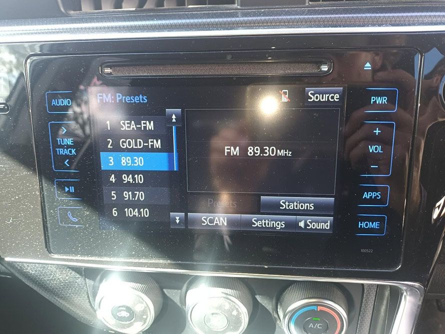 A Close Up of a Car's Dashboard Shows Fm Presets — South West 4WD Wreckers In Brisbane, QLD