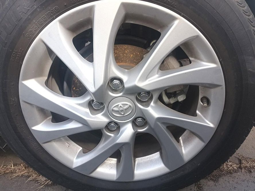 A Close Up of a Car Wheel with a Toyota Logo on It — South West 4WD Wreckers In Brisbane, QLD