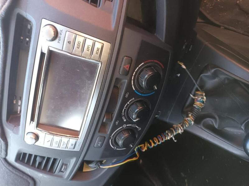 A Car Dashboard With a Phone Plugged Into It — South West 4WD Wreckers In Brisbane, QLD