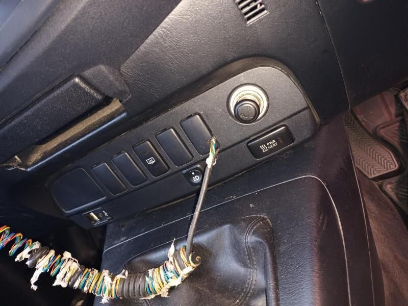 A Close Up of a Car Dashboard With Buttons and a Switch — South West 4WD Wreckers In Brisbane, QLD