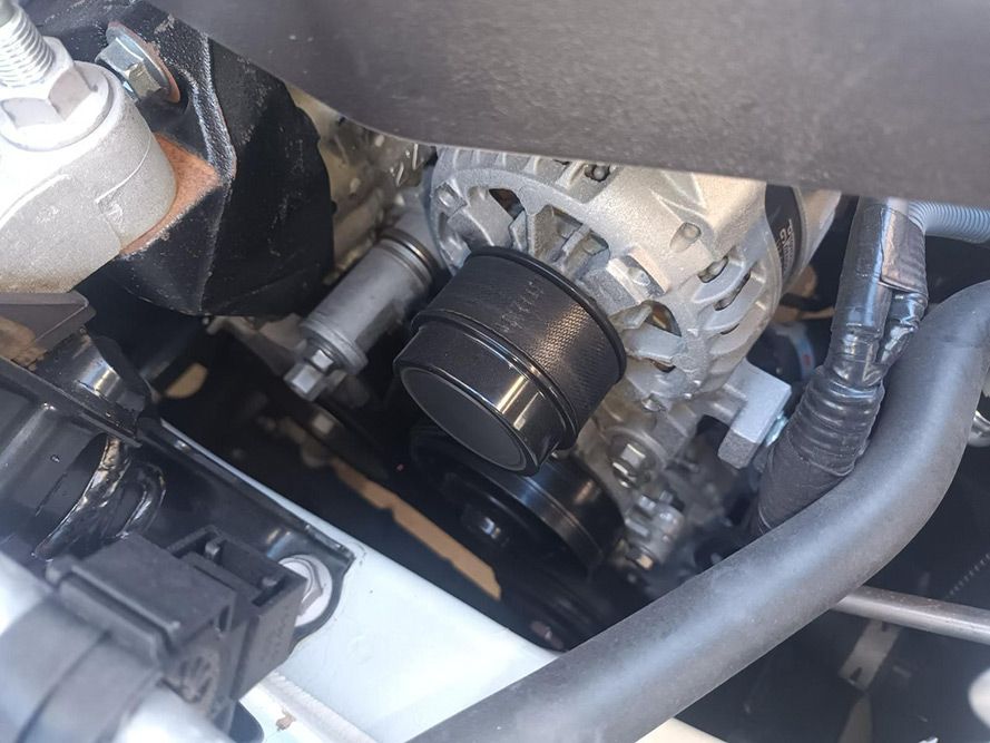 A Close Up of a Car Engine with a Belt on It — South West 4WD Wreckers In Brisbane, QLD