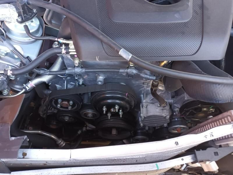 A Close Up of a Car Engine With a Belt on It — South West 4WD Wreckers In Brisbane, QLD