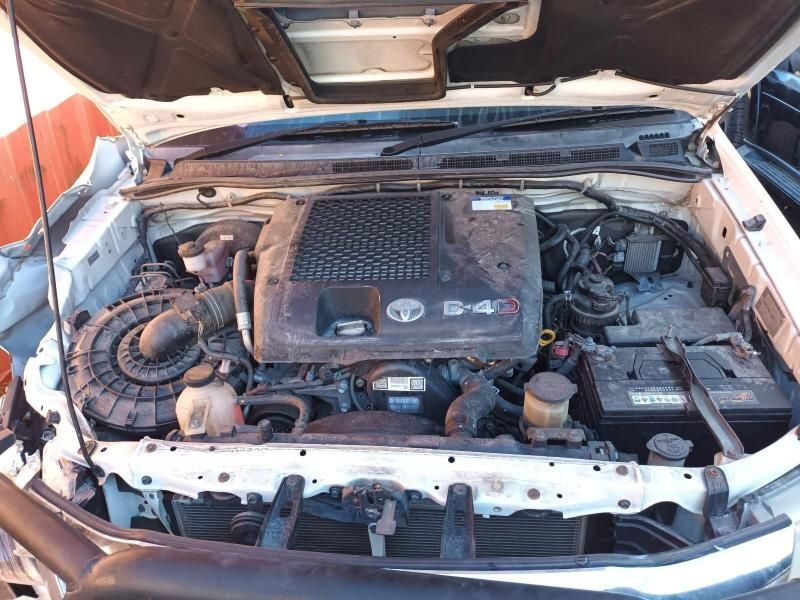The Engine of a White Car is Shown With the Hood Open — South West 4WD Wreckers In Brisbane, QLD