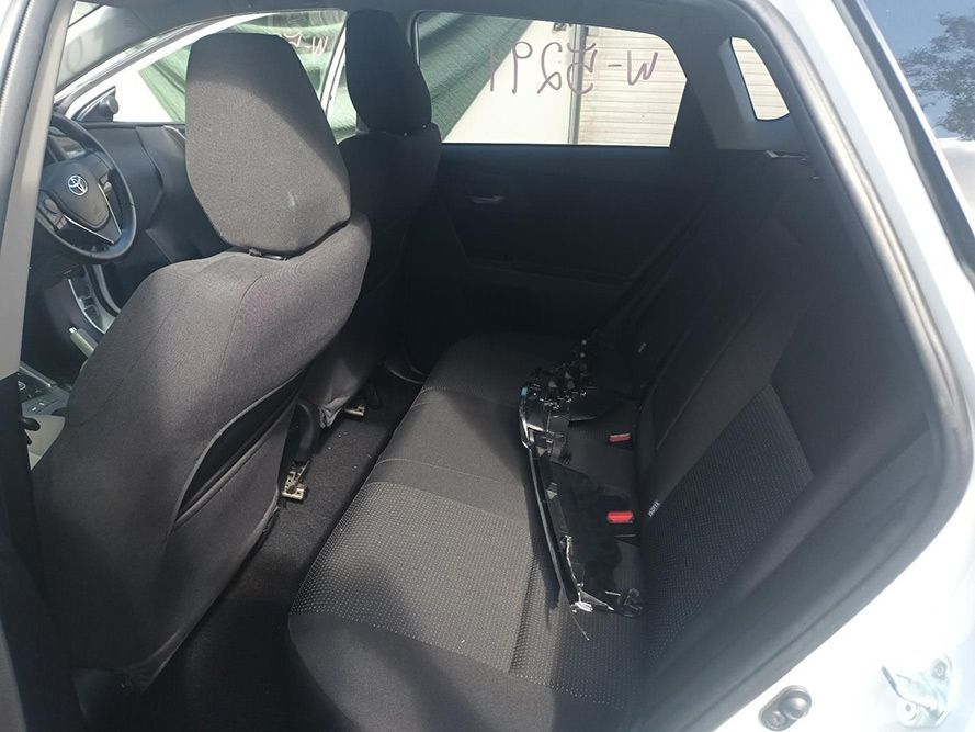 The Back Seat of a White Car with a Black Seat Cover — South West 4WD Wreckers In Brisbane, QLD