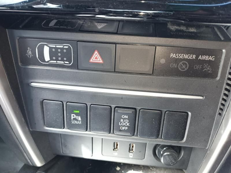 A Close Up of a Car Dashboard With a Passenger Airbag Button — South West 4WD Wreckers In Brisbane, QLD