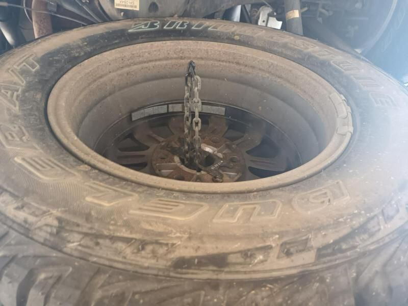 A Close Up of a Tire With a Chain Attached to It — South West 4WD Wreckers In Brisbane, QLD