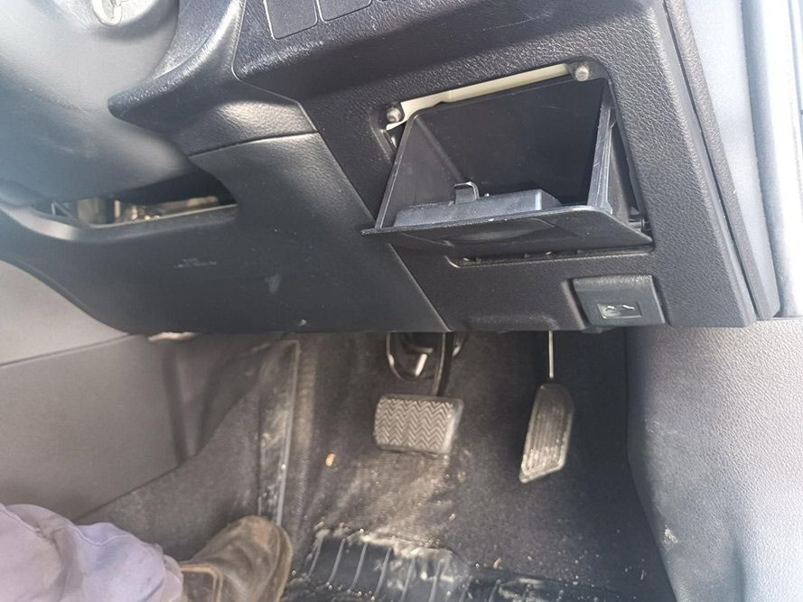 A Person is Sitting in the Driver's Seat of a Car — South West 4WD Wreckers In Brisbane, QLD