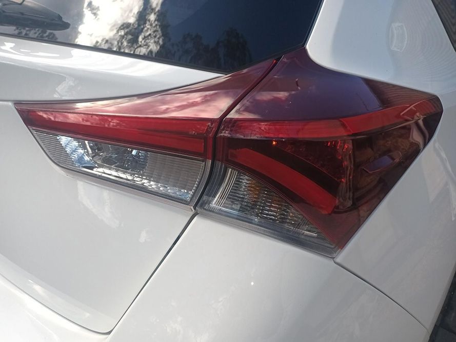 A Close Up of a White Car's Tail Light — South West 4WD Wreckers In Brisbane, QLD 
