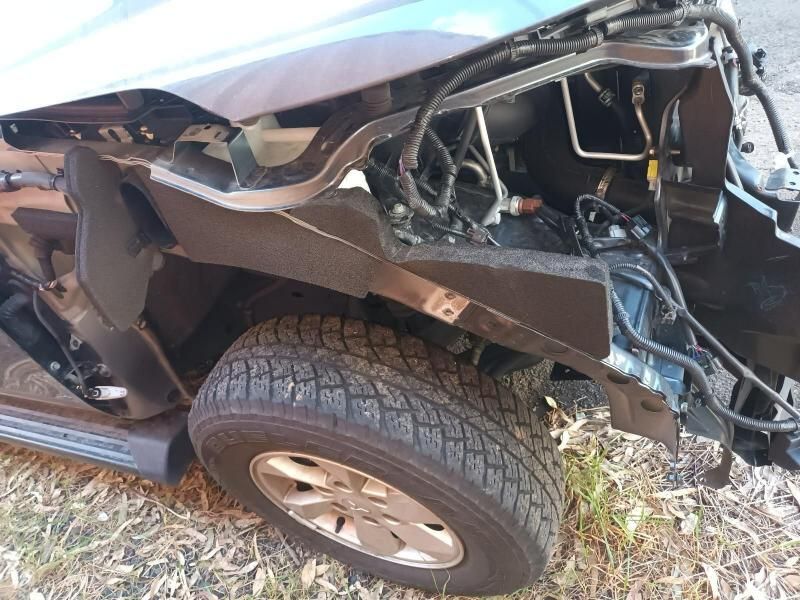 A Close Up of a Damaged Car With the Fender Missing — South West 4WD Wreckers In Brisbane, QLD