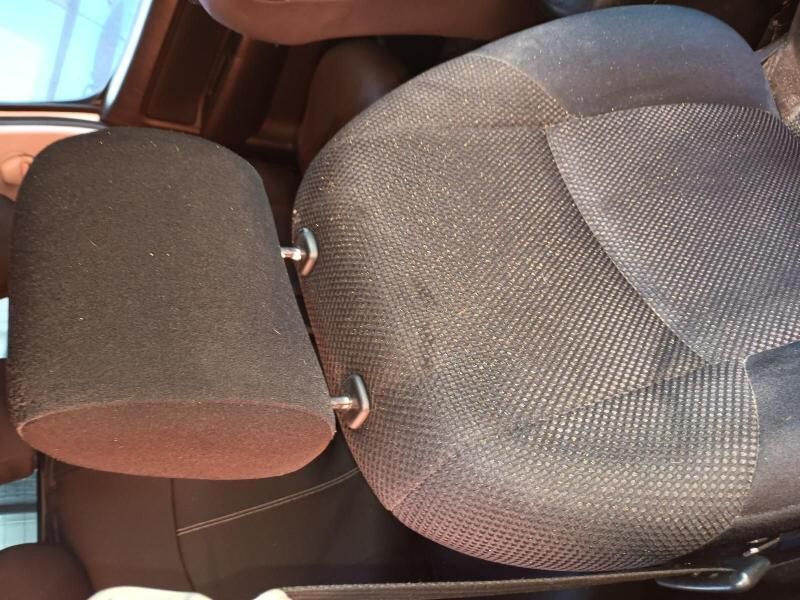 A Person is Sitting in the Back Seat of a Car — South West 4WD Wreckers In Brisbane, QLD