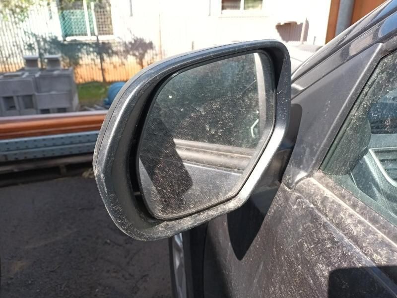 A Dirty Rear View Mirror on a Dirty Car — South West 4WD Wreckers In Brisbane, QLD