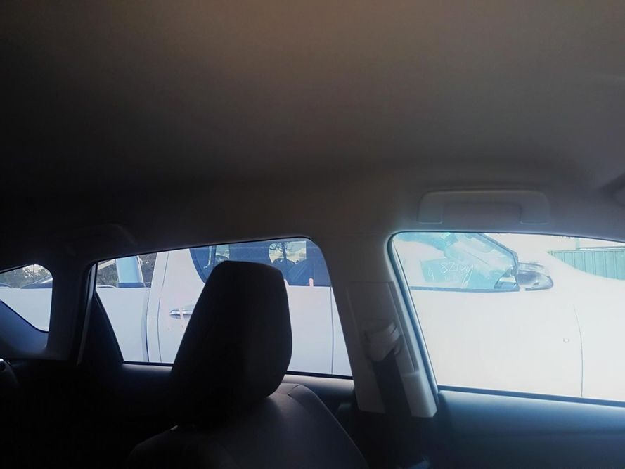The Inside of a Car with a White Van in the Background — South West 4WD Wreckers In Brisbane, QLD