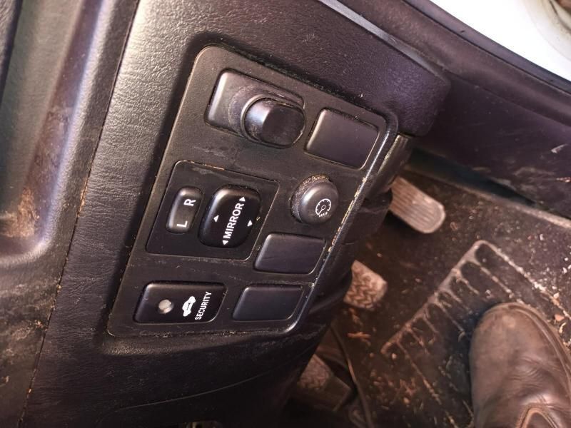 A Person 's Foot is on the Brake Pedal of a Car — South West 4WD Wreckers In Brisbane, QLD