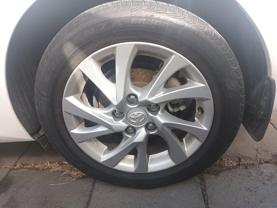 A Close Up of a Car Wheel with a Toyota Logo on It — South West 4WD Wreckers In Brisbane, QLD