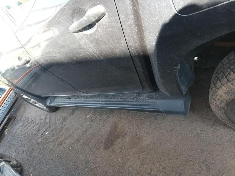 A Black Truck is Parked on the Side of the Road — South West 4WD Wreckers In Brisbane, QLD