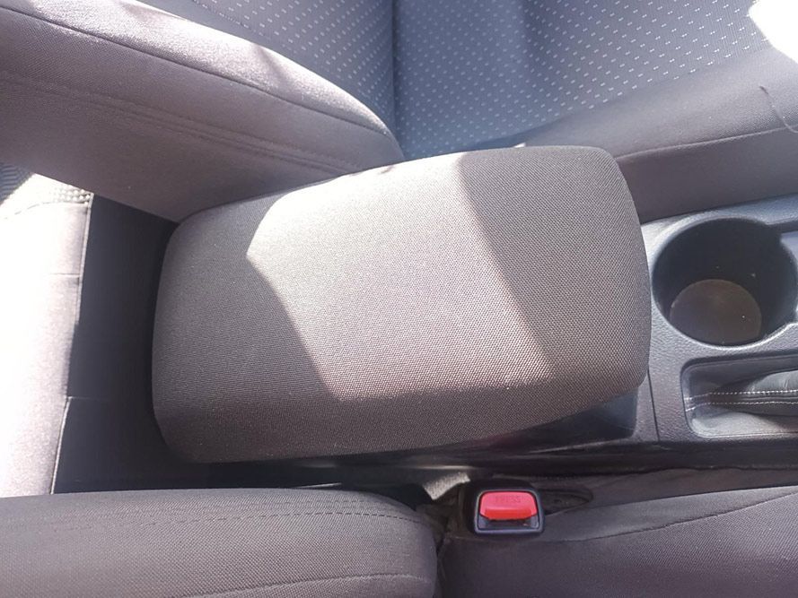 A Car Arm Rest with a Red  on It — South West 4WD Wreckers In Brisbane, QLD