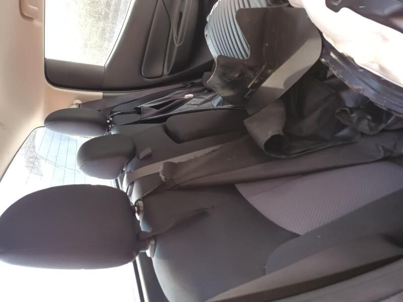 A Person is Sitting in the Back Seat of a Car — South West 4WD Wreckers In Brisbane, QLD