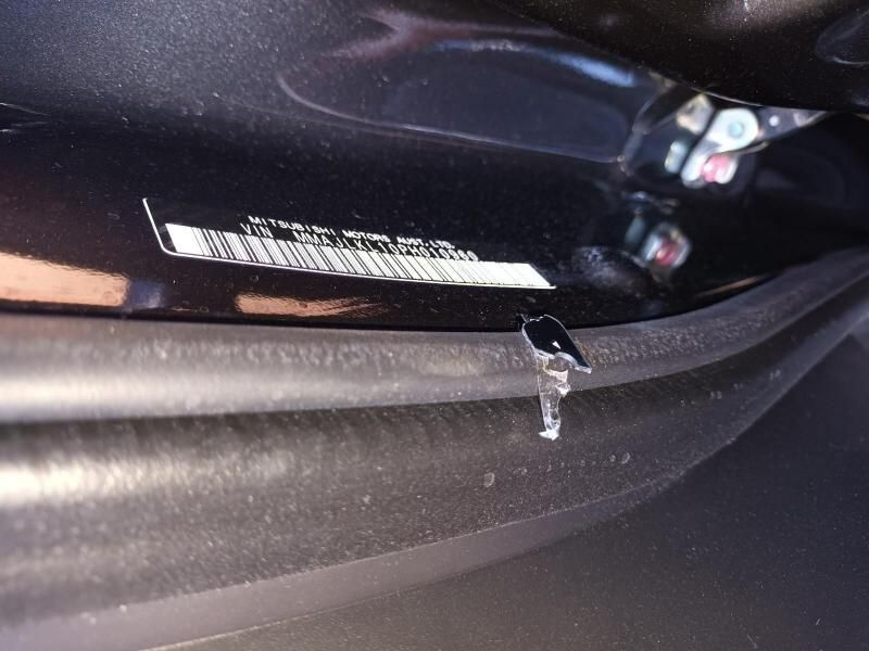 A Close Up of a Black Car With a Sticker on It — South West 4WD Wreckers In Brisbane, QLD