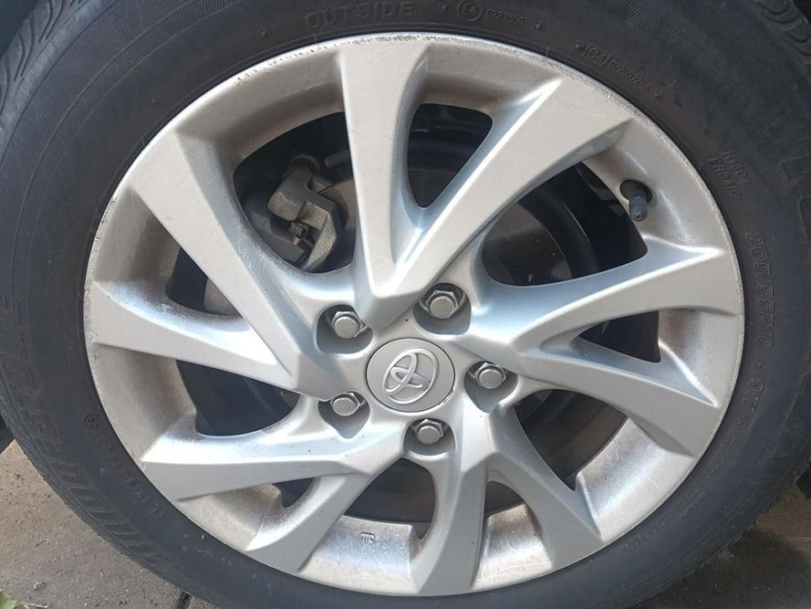 A Close Up of a Car Wheel with a Toyota Logo on It — South West 4WD Wreckers In Brisbane, QLD