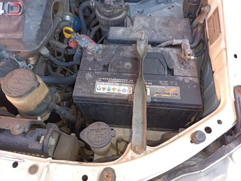 A Close Up of a Car Engine With a Battery and a Wrench — South West 4WD Wreckers In Brisbane, QLD