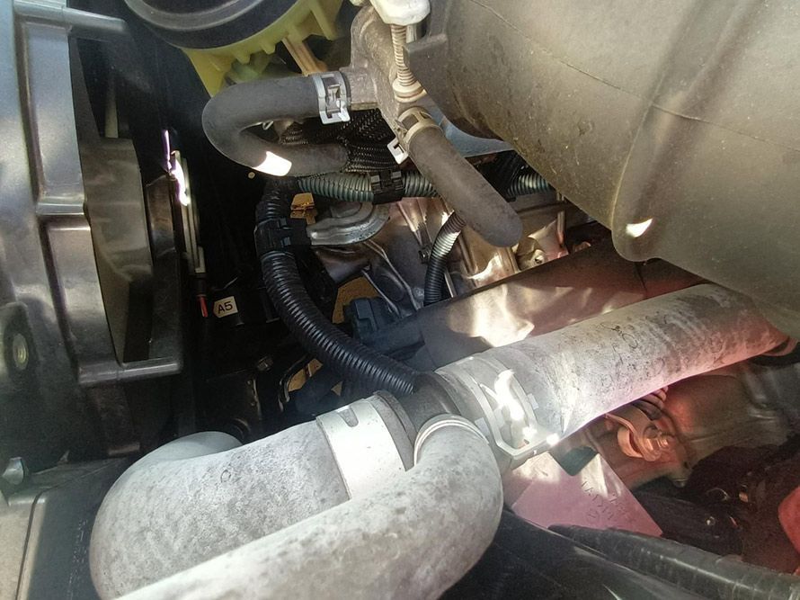 A Close Up of a Car Engine with a Hose Attached to It — South West 4WD Wreckers In Brisbane, QLD