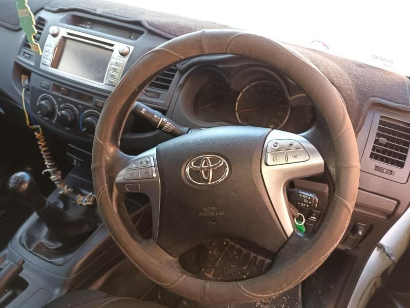 A Toyota Car Has a Steering Wheel Cover on It — South West 4WD Wreckers In Brisbane, QLD