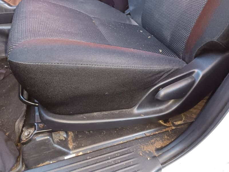 A Dirty Car Seat in a White Car — South West 4WD Wreckers In Brisbane, QLD