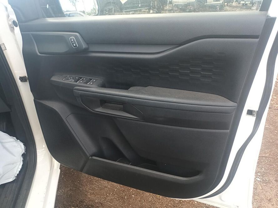 The Inside of a White Car with the Door Open — South West 4WD Wreckers In Brisbane, QLD