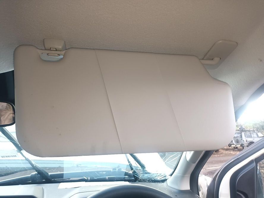 A Sun Visor is Hanging from the Ceiling of a Car — South West 4WD Wreckers In Brisbane, QLD