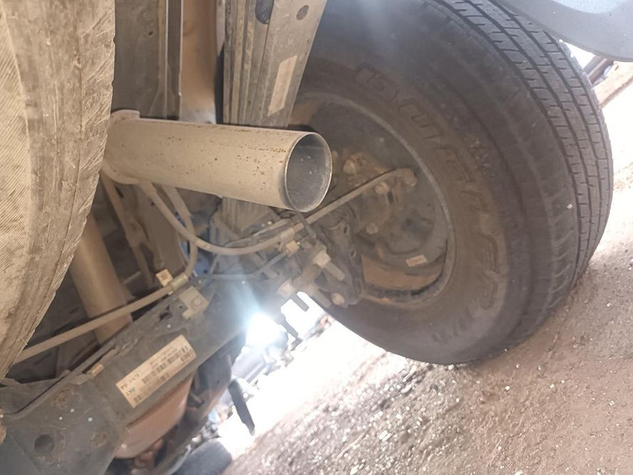 A Close Up of a Tire and Exhaust Pipe on a Car — South West 4WD Wreckers In Brisbane, QLD