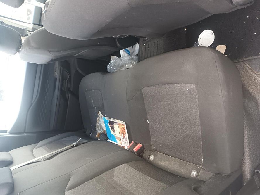 The Back Seat of a Car is Covered in Trash — South West 4WD Wreckers In Brisbane, QLD