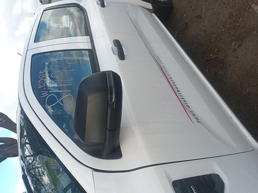 A White Truck is Parked on the Side of the Road — South West 4WD Wreckers In Brisbane, QLD