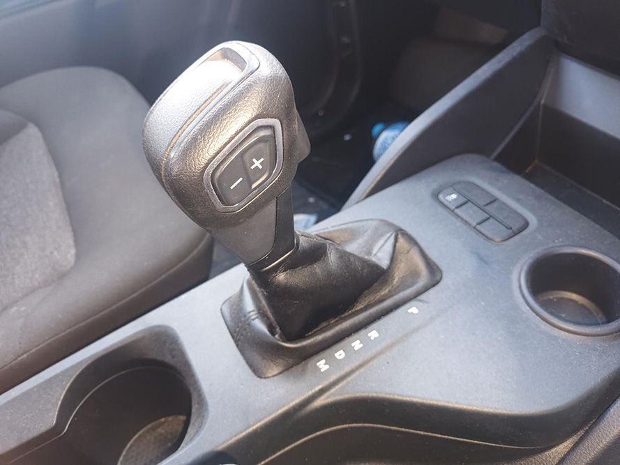 A Close Up of a Shifter in a Car with a Cup Holder — South West 4WD Wreckers In Brisbane, QLD