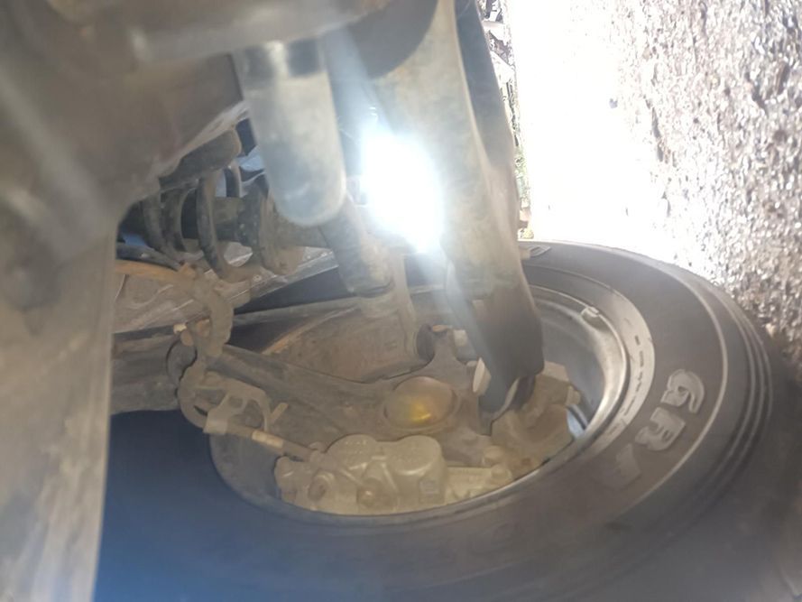 A Close Up of a Tire on a Car with a Light Shining on It — South West 4WD Wreckers In Brisbane, QLD