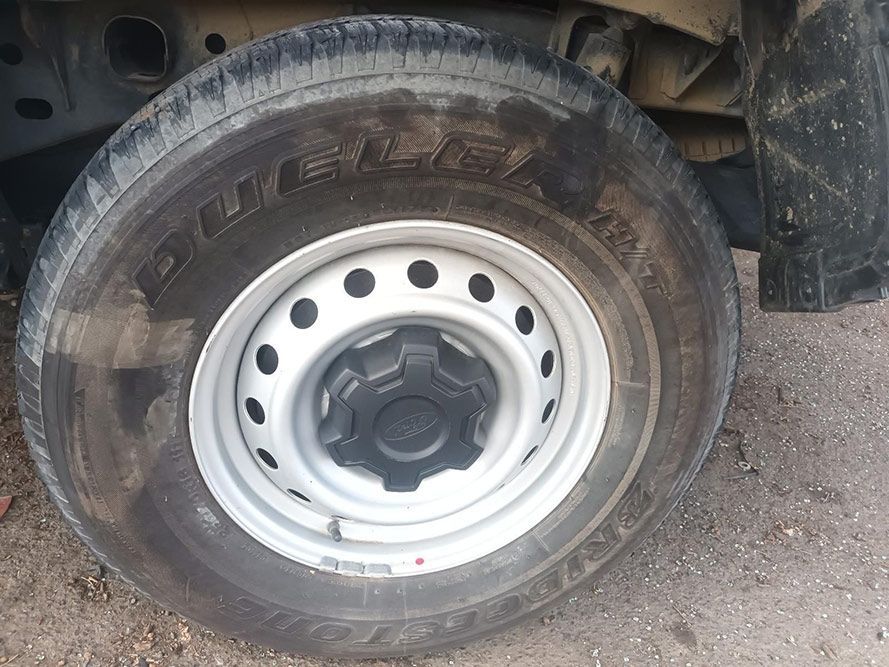 A Close Up of a Tire on a Car with a Metal Rim — South West 4WD Wreckers In Brisbane, QLD